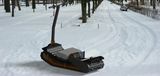 Potente utilità per il trasporto sulla neve Snowfox Motoslitta elettrica per agricoltori cingolati